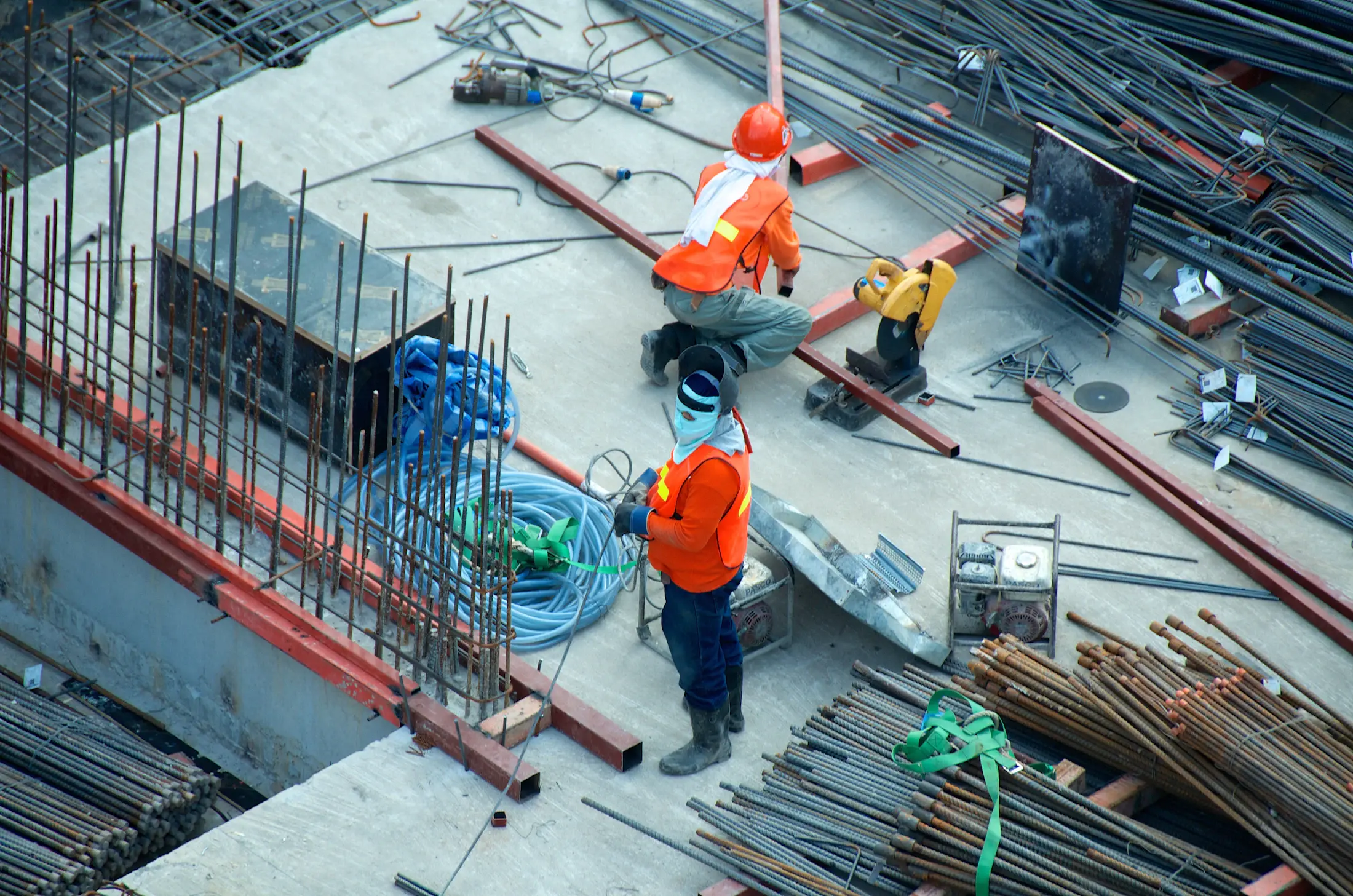 Construction professionals coordinating work on site